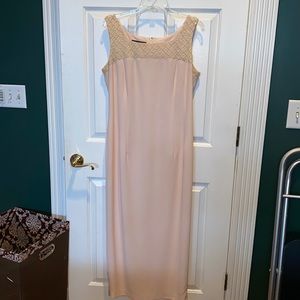 Beautiful light pink evening gown with beading around neckline